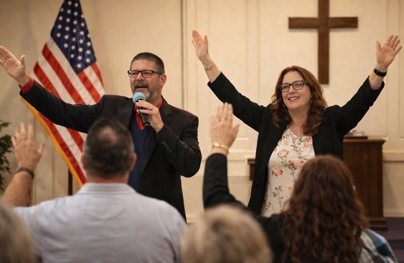 David and Kelly Taylor speaking at church